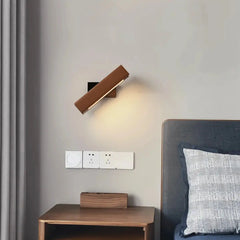 360° swiveling wooden wall lights by Zenvia Essentials on white wall