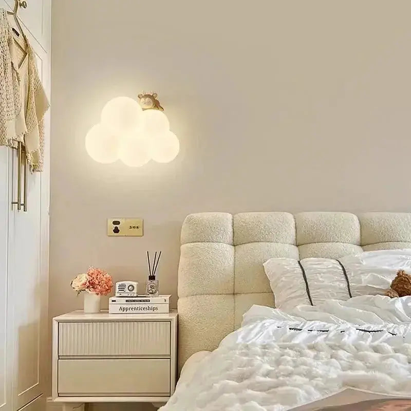 Zenvia Essentials Cloud-Shaped LED Wall Lights for Living Room hang above a white nightstand in a modern bedroom.