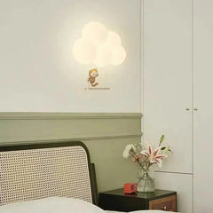 Cloud-Shaped LED Wall Light in a bedroom setting with Zenvia Essentials design