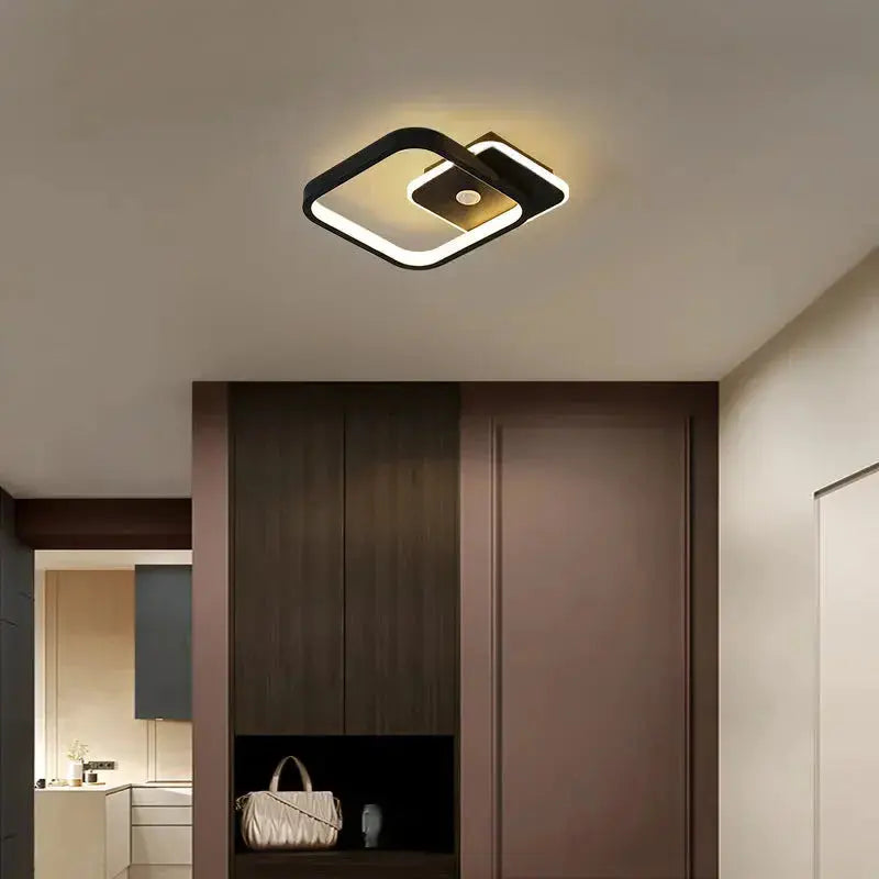 Zenvia Essentials Human PIR Motion Sensor LED Ceiling Light For Bedroom mounted on a beige ceiling in a modern bedroom.