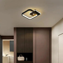 Zenvia Essentials Human PIR Motion Sensor LED Ceiling Light For Bedroom mounted on a beige ceiling in a modern bedroom.