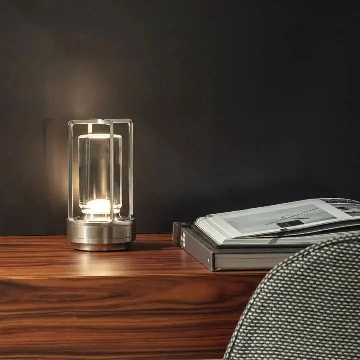 Zenvia Essentials Elegant Crystal Rechargeable Table Lamp, a silver metal table lamp on wooden table
