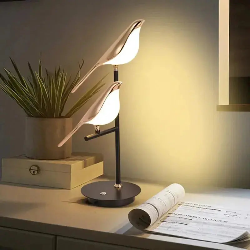 Black base Zenvia Essentials Golden Bird Table Lamp with white bird-shaped shade