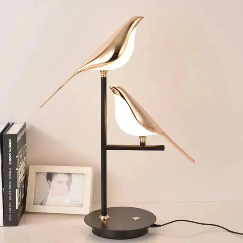 Zenvia Essentials Golden Bird Table Lamp for Bedroom with black base and gold bird-shaped lampshade