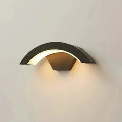 Zenvia Essentials Modern Curved LED Motion Sensor Wall Light with a curved metal design and black finish