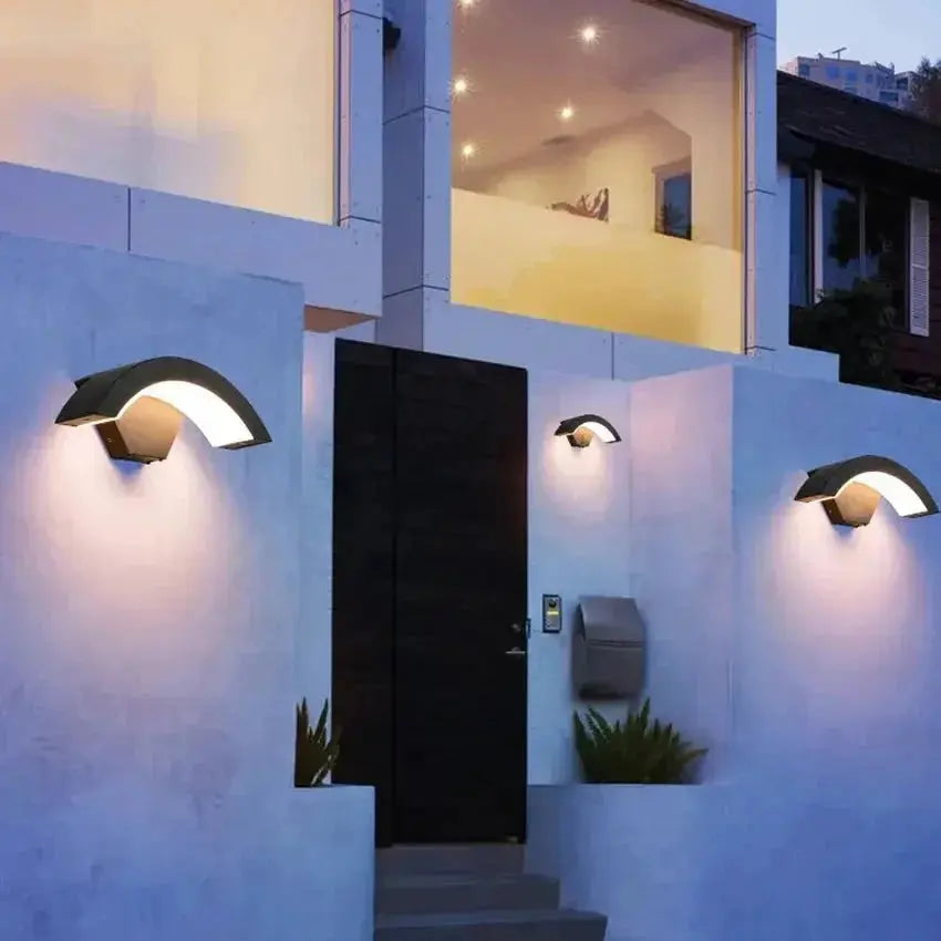 Zenvia Essentials Modern Curved LED Motion Sensor Wall Light with curved design and warm glow