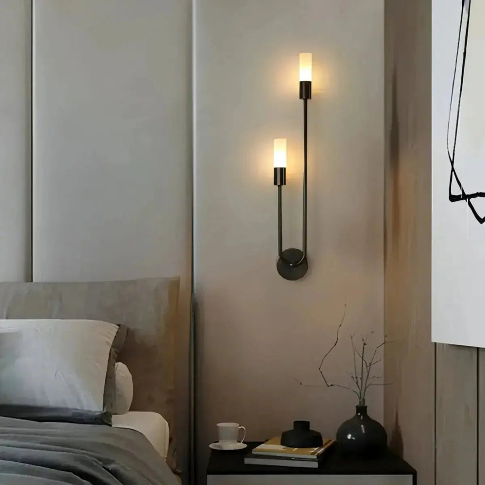 Zenvia Essentials Modern Gold LED wall lights sconces on a light beige wall.