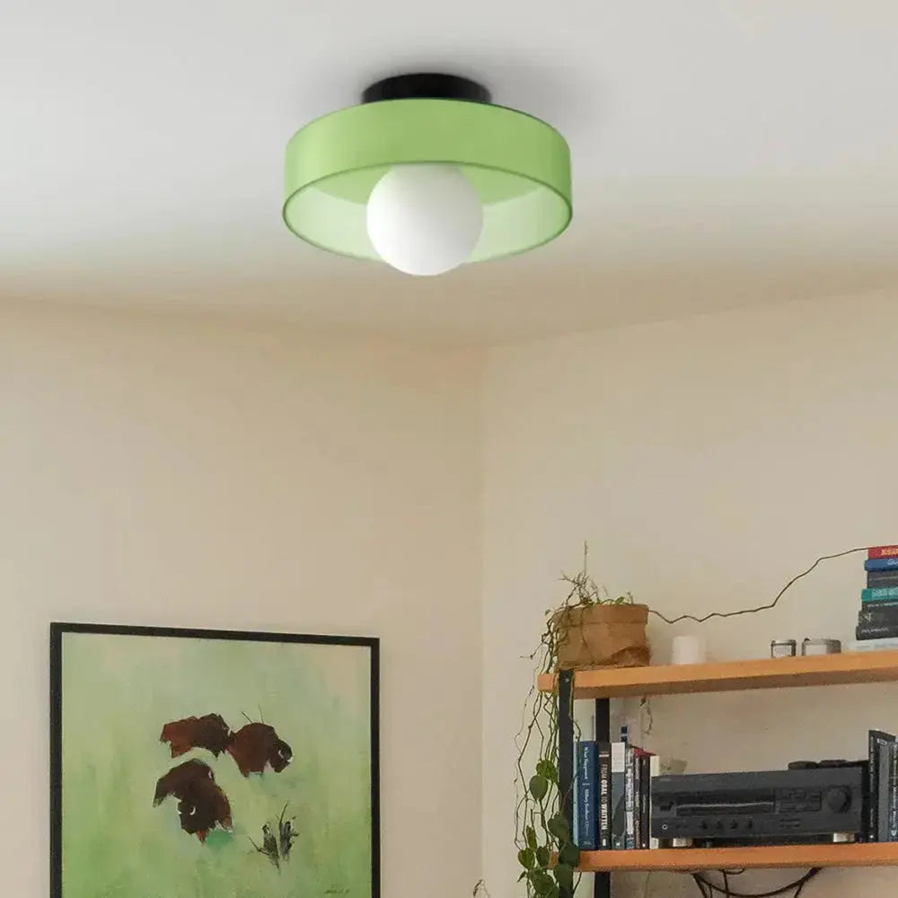 Zenvia Essentials Modern Round Glass Ceiling Light For Bedroom with green shade, mounted in a bedroom