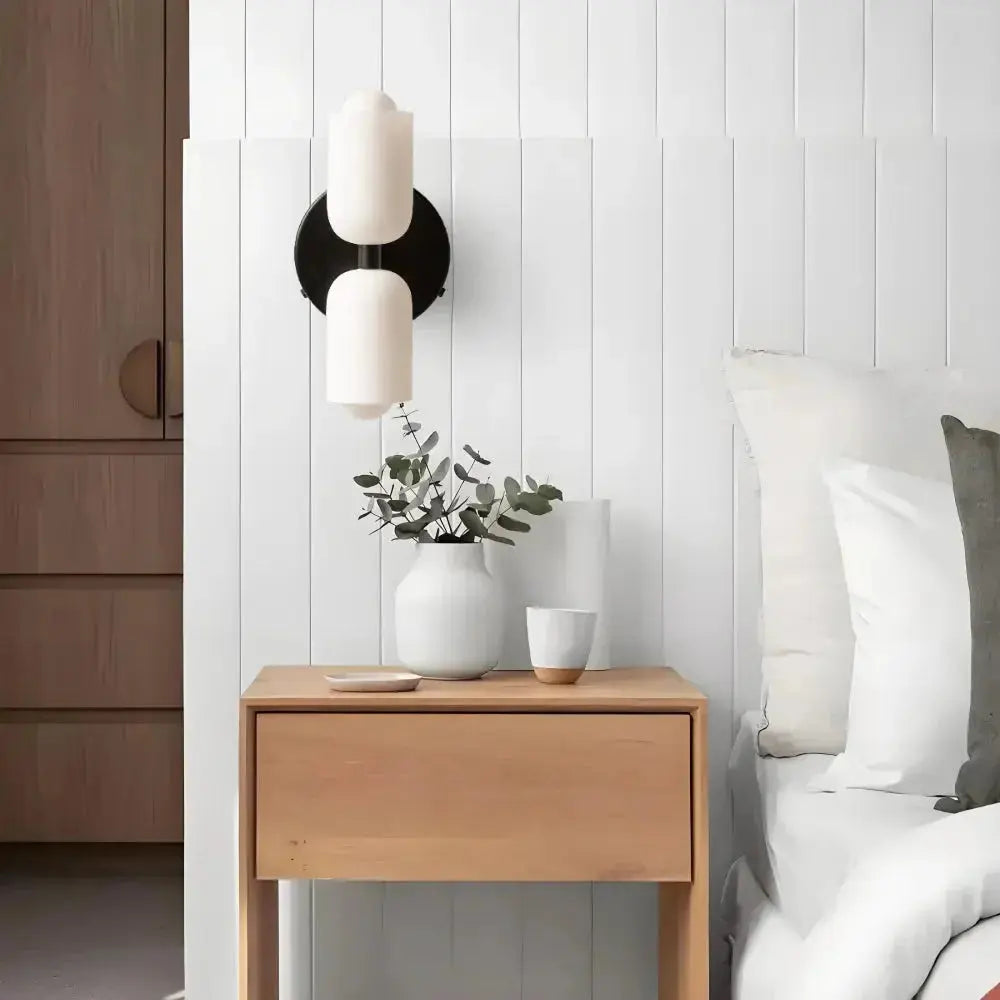 Zenvia Essentials Modern Up Down Acrylic Wall Light on a white wall