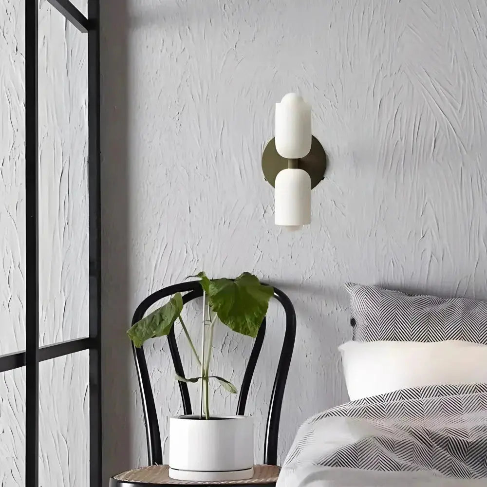 Zenvia Essentials Modern Up Down Acrylic Wall Light mounted on light grey wall