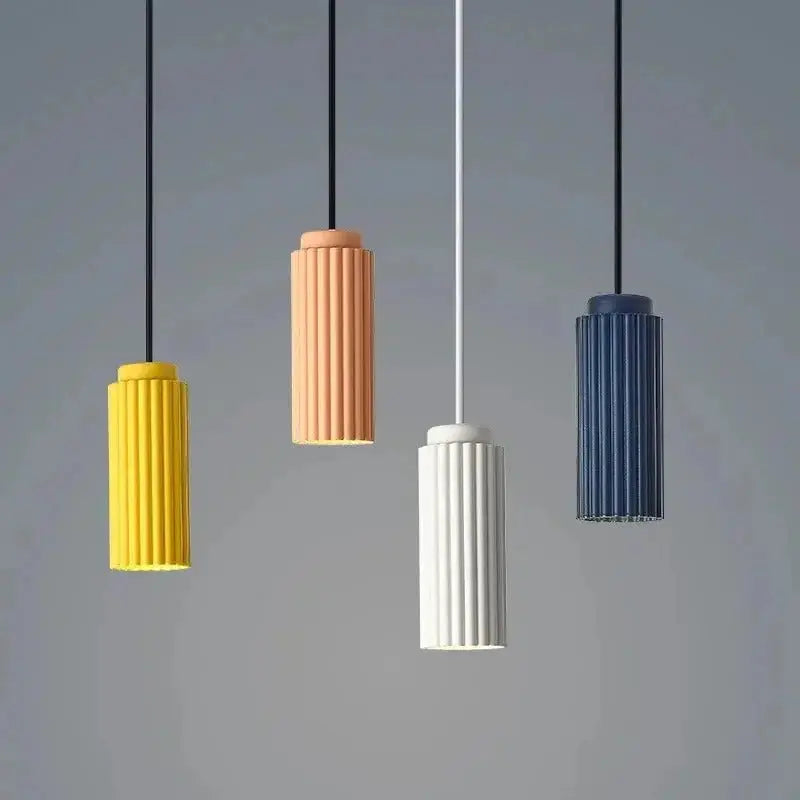 Zenvia Essentials Nordic Minimalist Pendant Light with striped patterns in yellow, orange, and white.