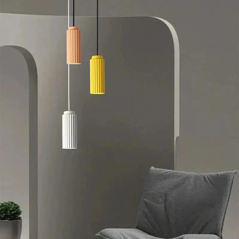 Zenvia Essentials Nordic Minimalist Pendant Light with orange, yellow, and white cylindrical pendants hanging from ceiling