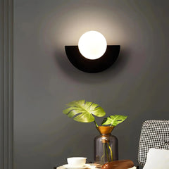 Zenvia Essentials Nordic Semicircle Wall Lights with black circular design and white globe light on gray wall