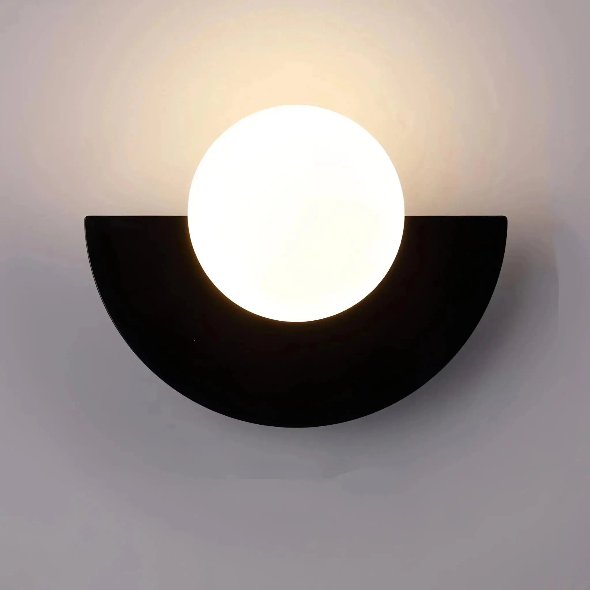 Black Nordic Semicircle Wall Lights with a cool white glow