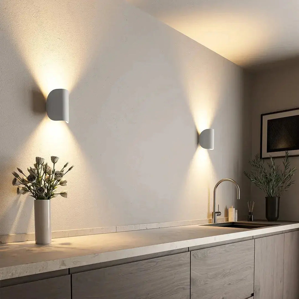 Zenvia Essentials Up & Down Modern Wall Sconce Light mounted above sink in modern kitchen